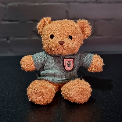 Плюшевый мишка, рыжий.